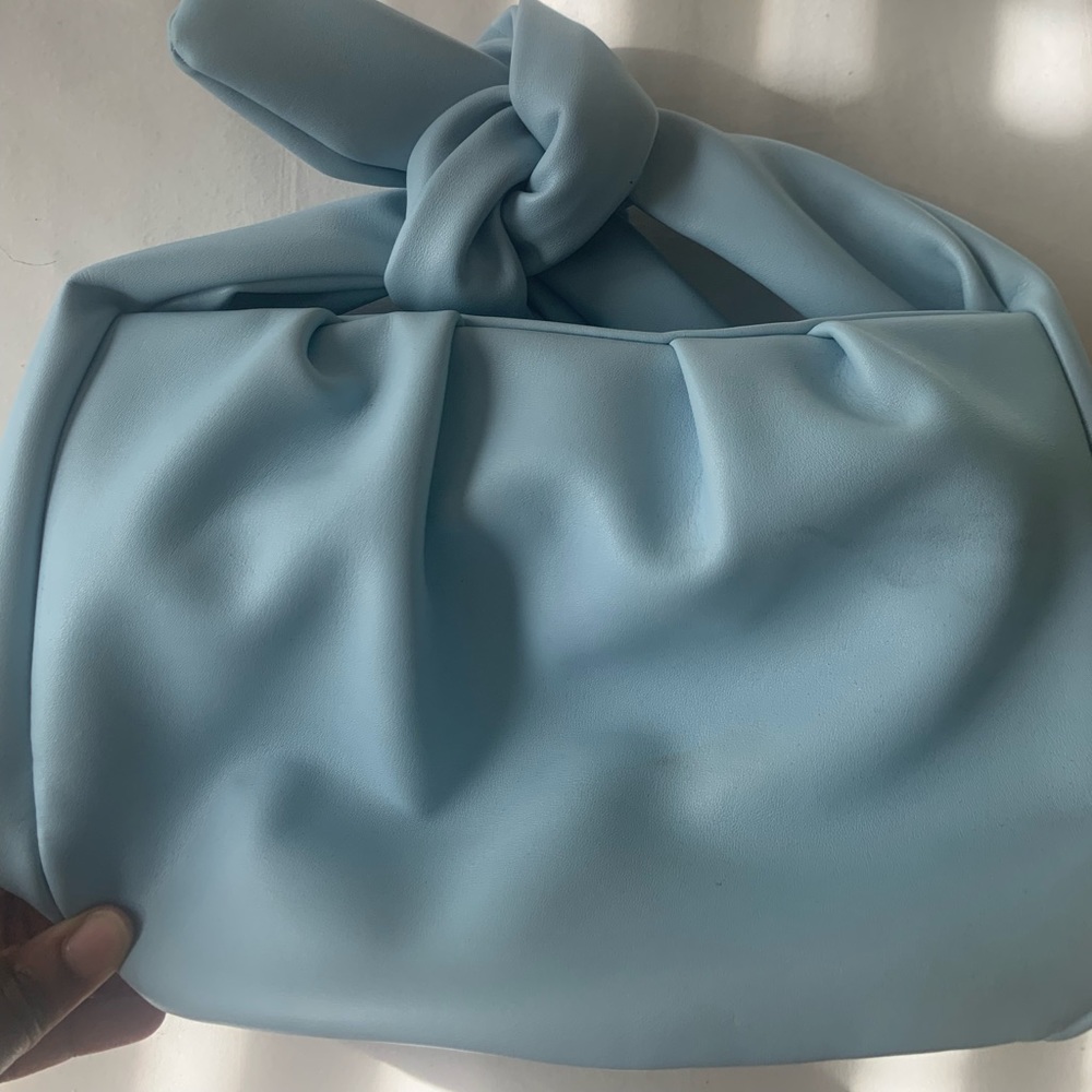 Baby blue knot handle bag